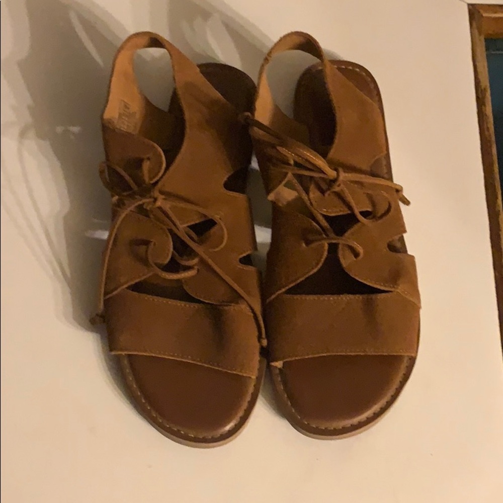 Toms sandals.